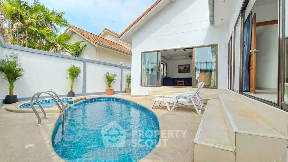 Charming villa with private pool and sunlit patio, perfect for relaxation.