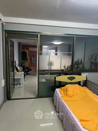 Cozy bedroom with sliding glass doors and modern decor