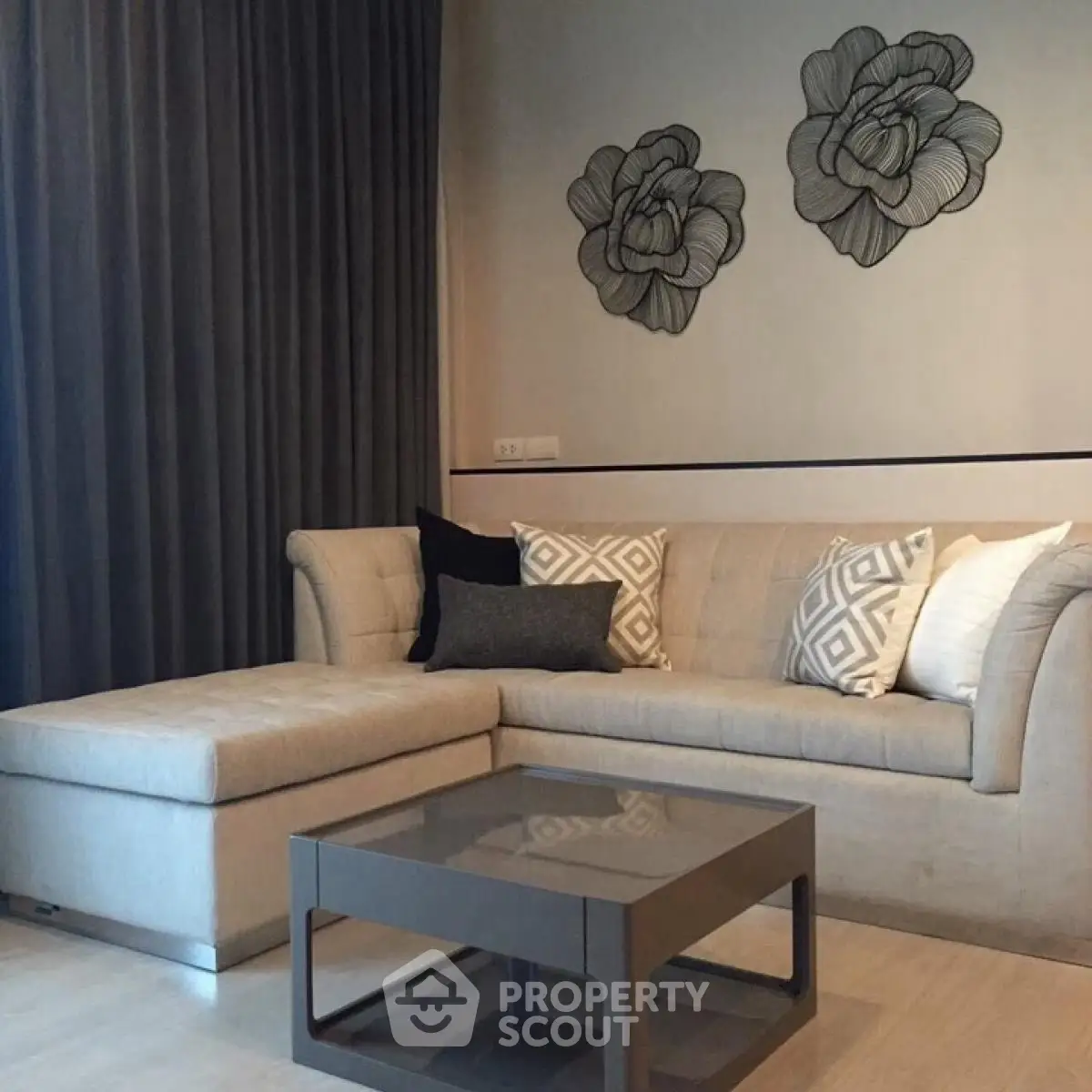 Elegant living room with modern sofa and stylish wall decor