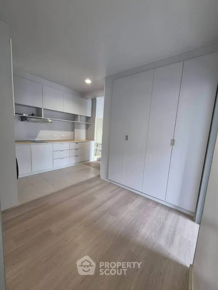 Modern kitchen with sleek cabinetry and ample storage space