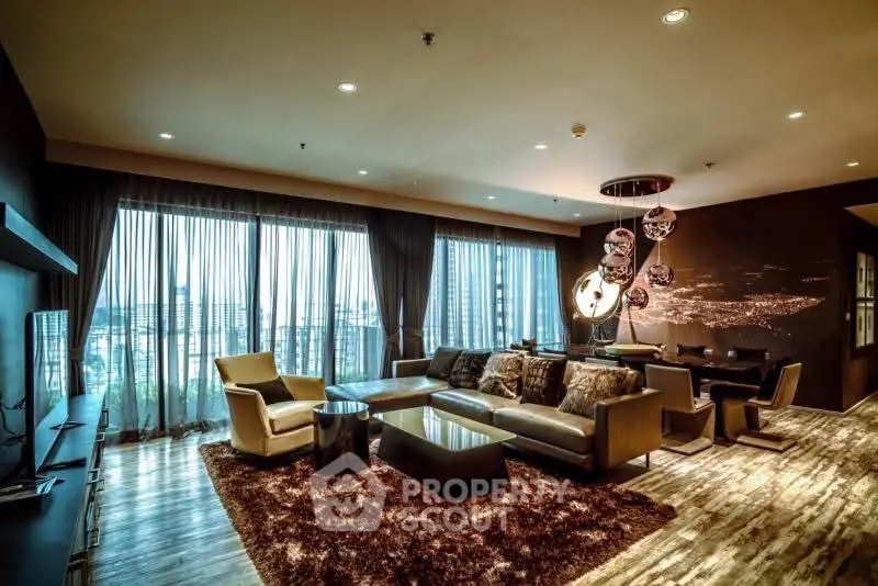 Luxurious modern living room with panoramic city view and elegant furnishings.
