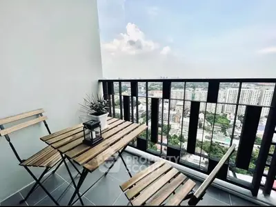 Chic balcony with city view, perfect for relaxation and enjoying the skyline.