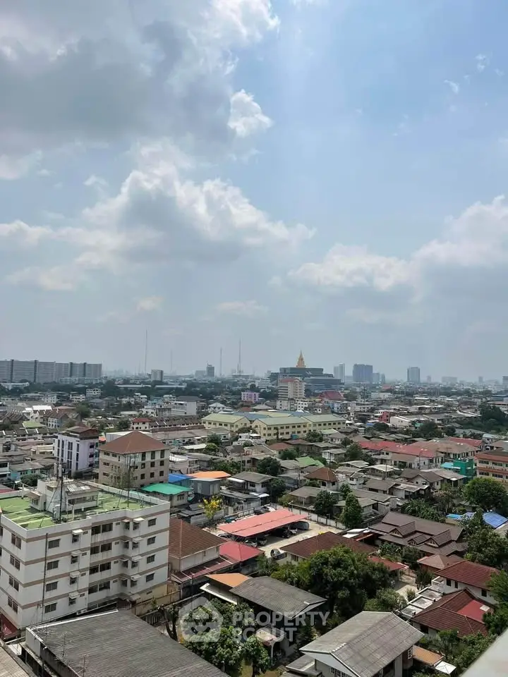 Stunning cityscape view from high-rise building showcasing urban living and skyline.
