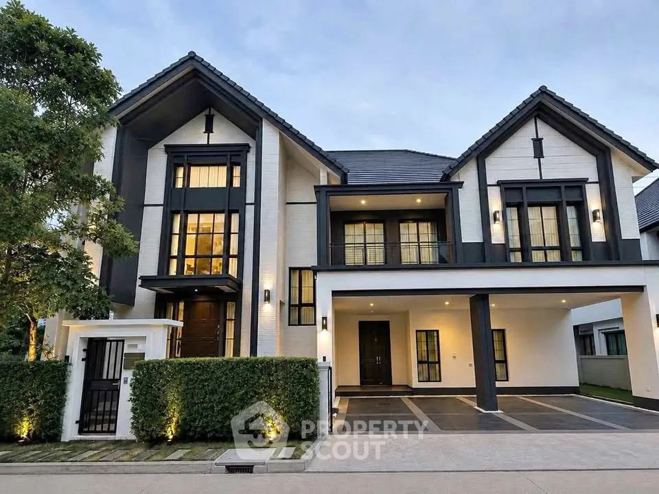 Stunning modern two-story house with elegant facade and spacious driveway