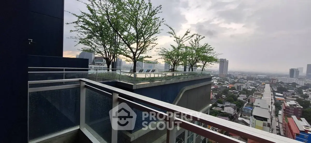 Stunning rooftop view with lush greenery and cityscape panorama