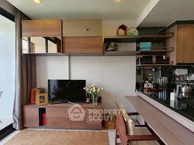 Modern living room with stylish wooden furniture and open kitchen layout