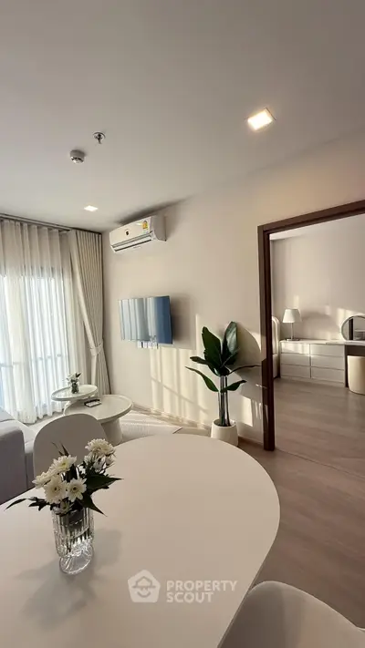 Modern living room with elegant decor and natural light