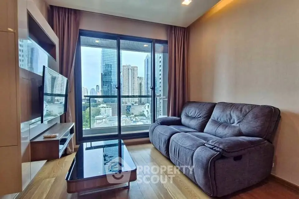Modern living room with city view and cozy seating area
