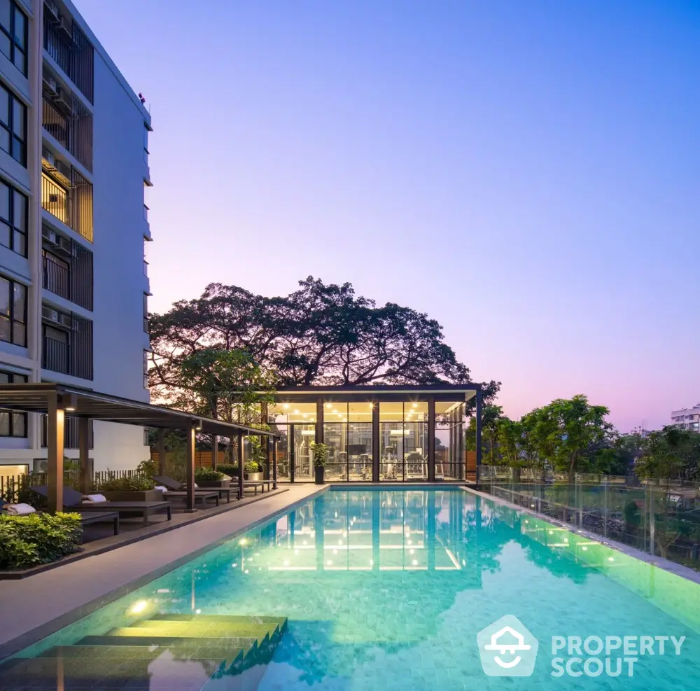 Luxurious modern apartment with stunning pool and sunset view