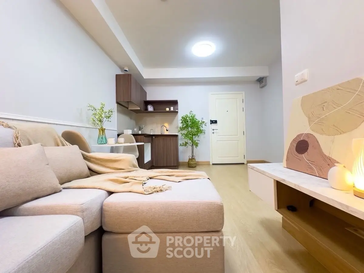 Cozy living room with modern open kitchen and stylish decor