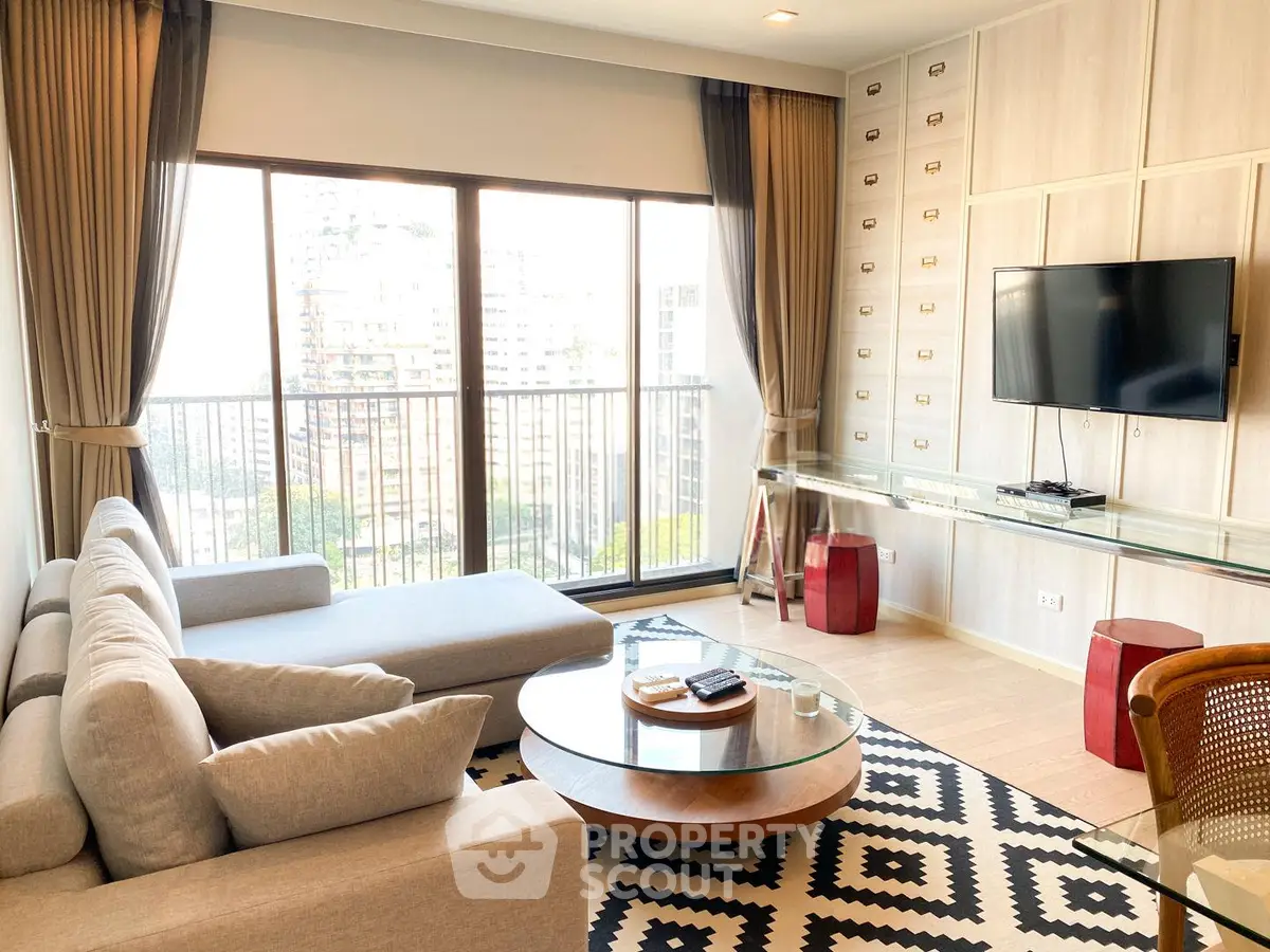Stylish living room with modern decor and city view from large windows