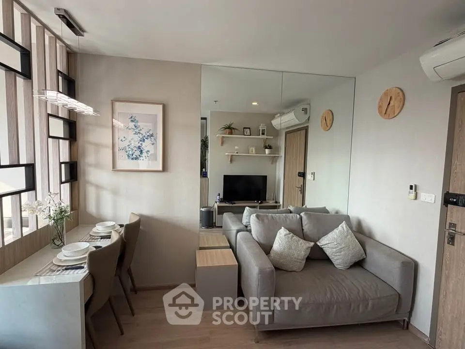 Modern living room with cozy sofa and stylish decor