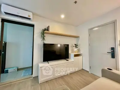 Modern living room with sleek TV setup and stylish decor