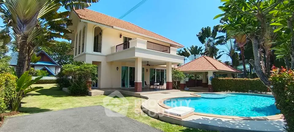 Stunning tropical villa with private pool and lush garden, perfect for luxury living.