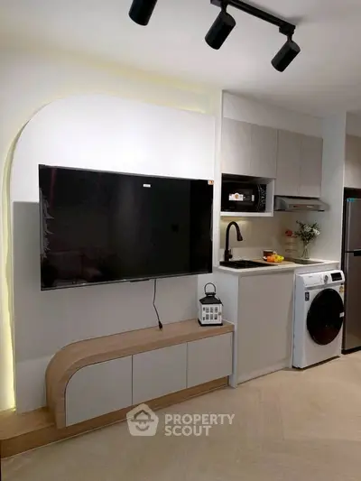 Modern kitchen with sleek appliances and stylish cabinetry