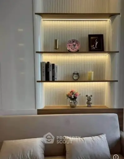 Elegant living room with modern shelving and ambient lighting