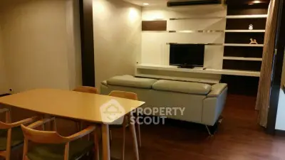 Modern living room with sleek furniture and built-in TV unit, perfect for stylish urban living.