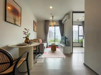 Modern living room with city view, stylish decor, and natural light.