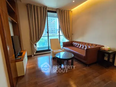 Elegant living room with leather sofa, modern TV unit, and large window with city view.