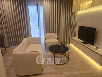 Modern living room with elegant furniture and stylish decor