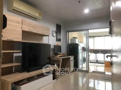 Modern living room with sleek furniture and home office setup