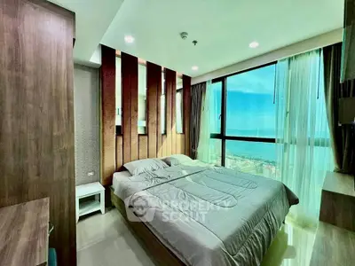 Luxurious bedroom with panoramic city view and modern decor