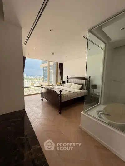 Luxurious bedroom with city view and elegant bathtub in modern apartment