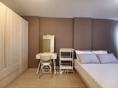 Modern bedroom with stylish furniture and neutral tones