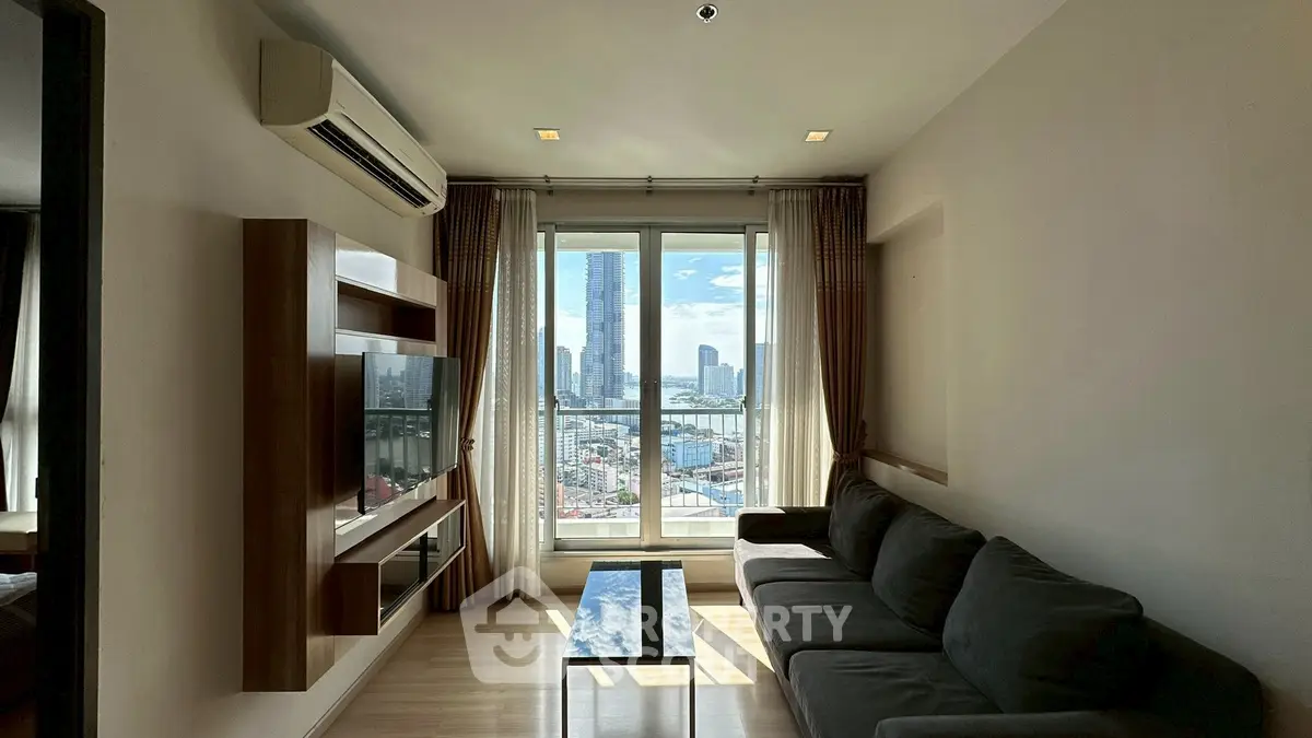 Modern living room with city view, large window, and stylish furniture.
