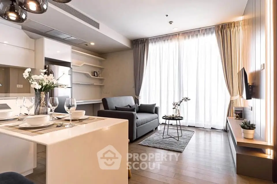 Modern living room with elegant decor, open layout, and abundant natural light.