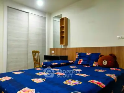 Cozy bedroom with modern decor and plush bedding, perfect for relaxation.