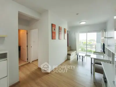 Bright and modern living room with balcony view in a stylish apartment