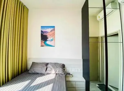 Modern bedroom with stylish decor and natural light