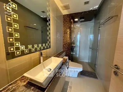 Luxurious modern bathroom with elegant fixtures and stylish tile design