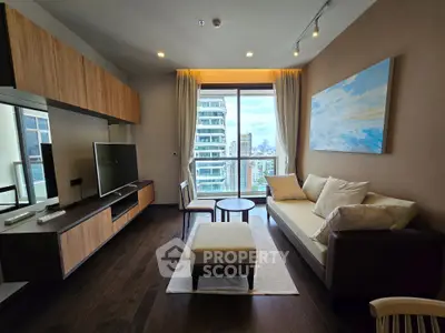 Modern living room with city view, stylish furniture, and natural light.