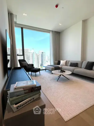 Modern living room with panoramic city view, stylish furniture, and elegant decor in a high-rise apartment.