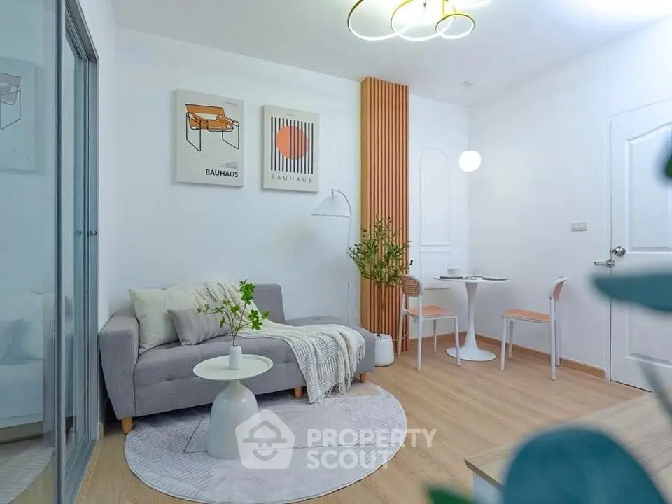 Stylish modern living room with minimalist decor and cozy seating area.