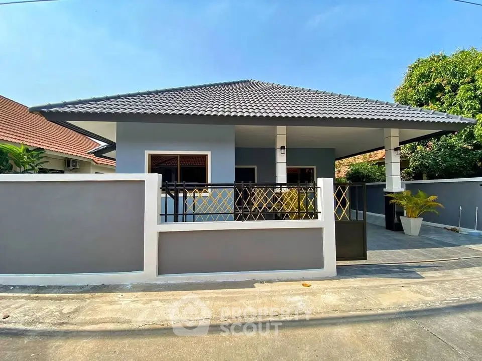 Charming single-story home with modern design and spacious outdoor area, perfect for family living.