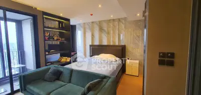 Luxurious bedroom with modern decor and stunning city view from balcony