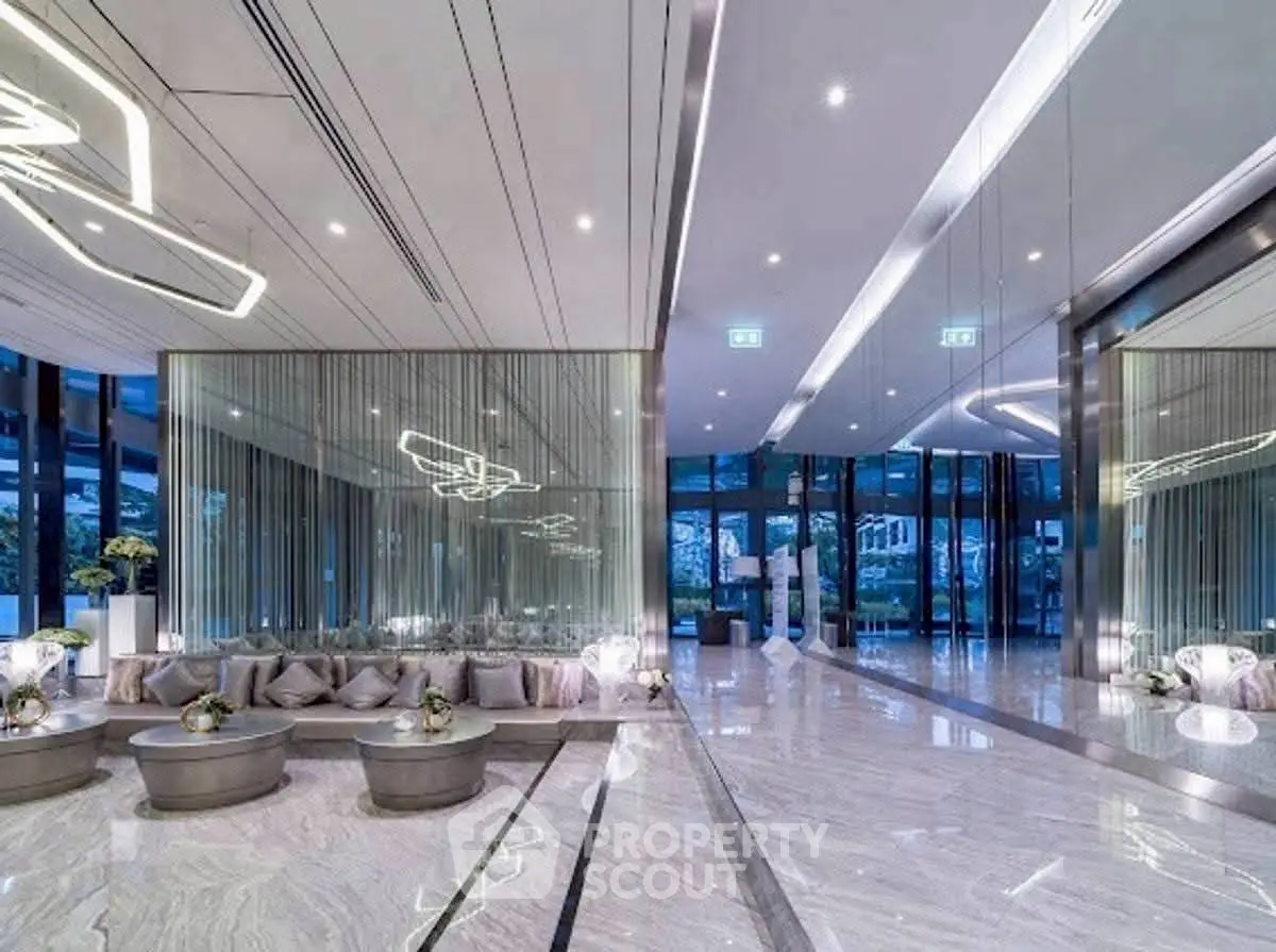 Luxurious modern building entrance with sleek design and ambient lighting