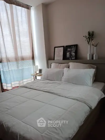 Cozy bedroom with elegant decor and natural light