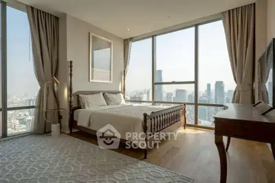 Luxurious bedroom with panoramic city views and elegant decor