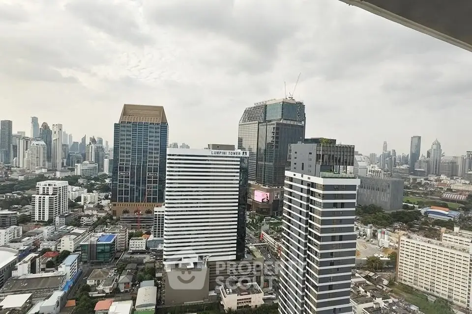 Stunning cityscape view from high-rise building showcasing urban skyline and modern architecture.