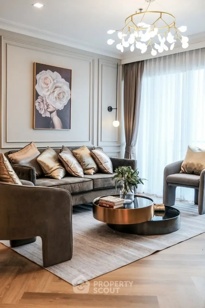 Luxurious living room with elegant decor and modern lighting, featuring plush seating and a stylish coffee table.