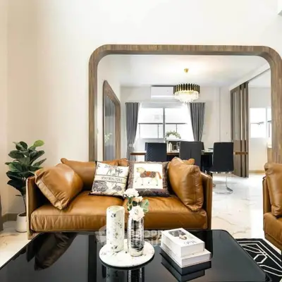 Luxurious living room with elegant decor and modern furniture, perfect for stylish urban living.
