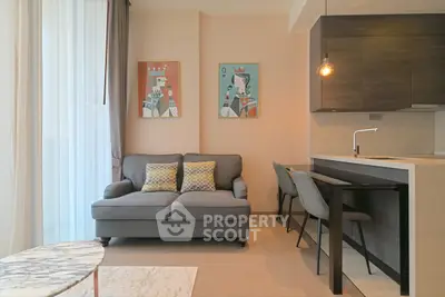 Modern living room with stylish decor and open kitchen layout