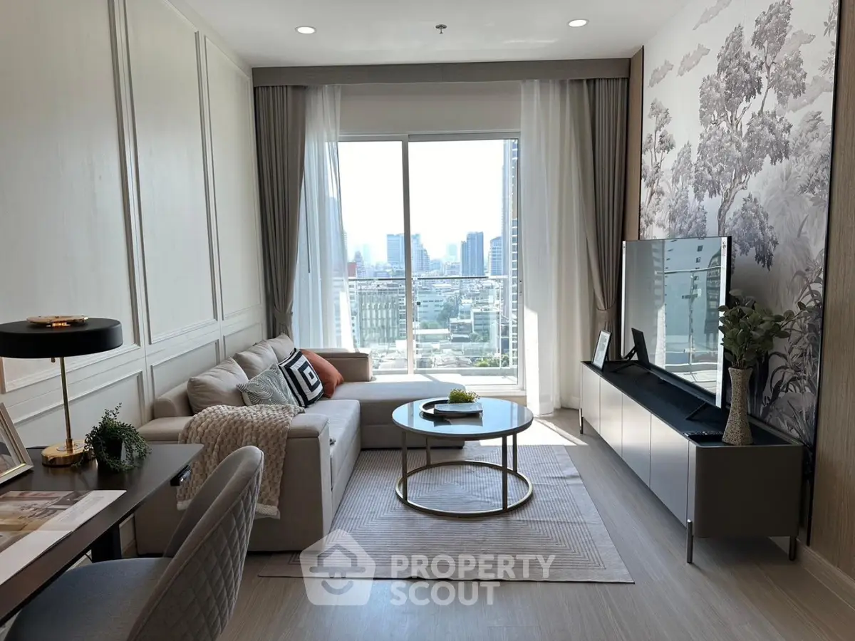 Modern living room with city view, stylish decor, and natural light.