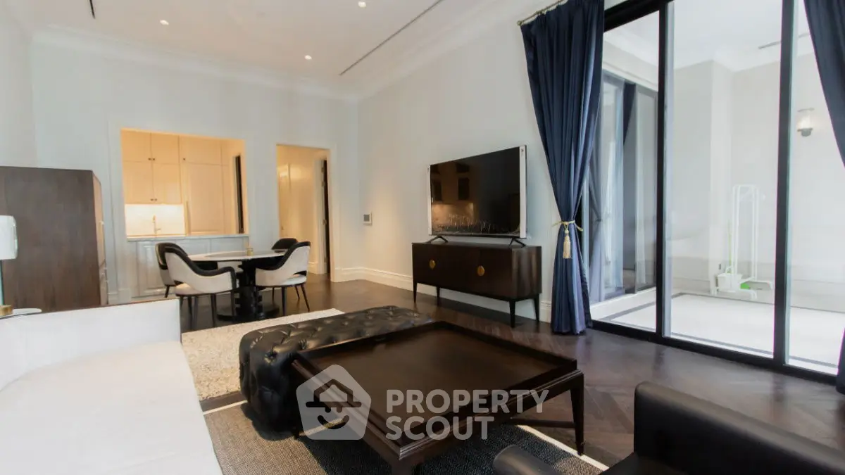 Luxurious modern living room with elegant furniture and large TV