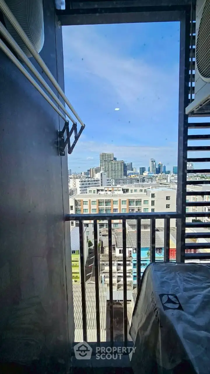 Stunning cityscape view from a high-rise balcony, perfect for urban living.
