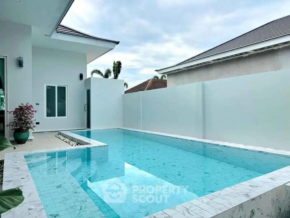 Luxurious private pool in modern villa with serene ambiance and elegant design.